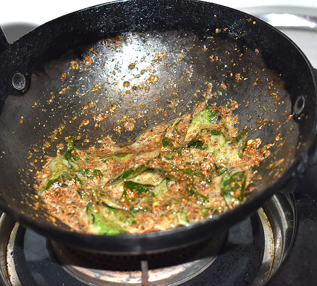 Heat 2 tbsp oil, add mustard, chan dal, urad dal, asafoetida, ground fenugreek, cumin, coriander, cumin, pepper powder 