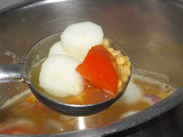Cover lid & cook for 3 to 4 whistles