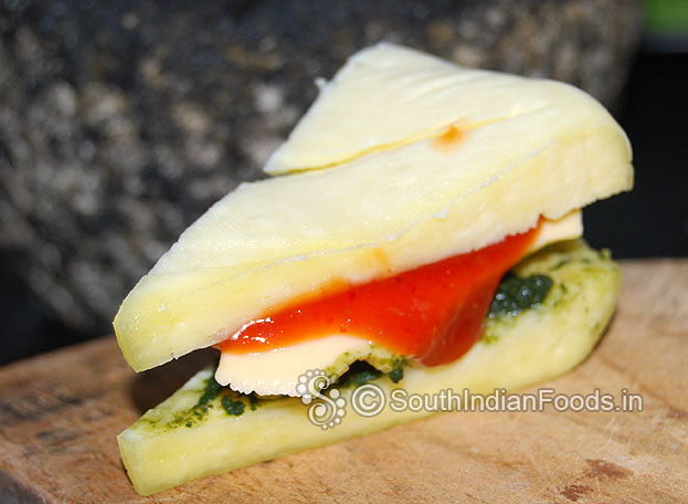Cover with another paneer slice