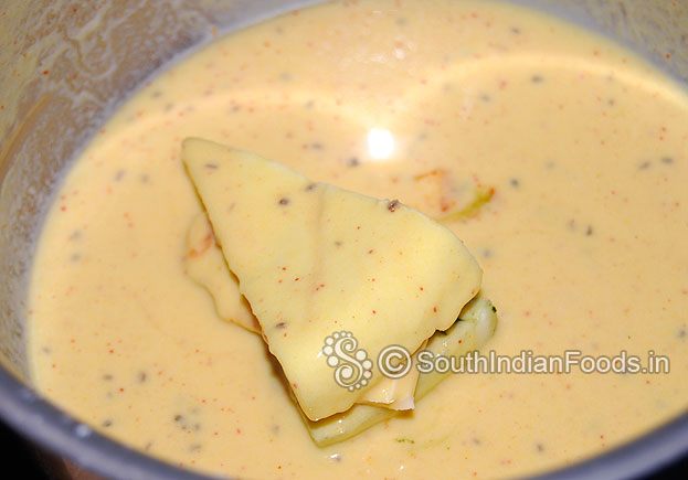 Dip in the gram flour batter