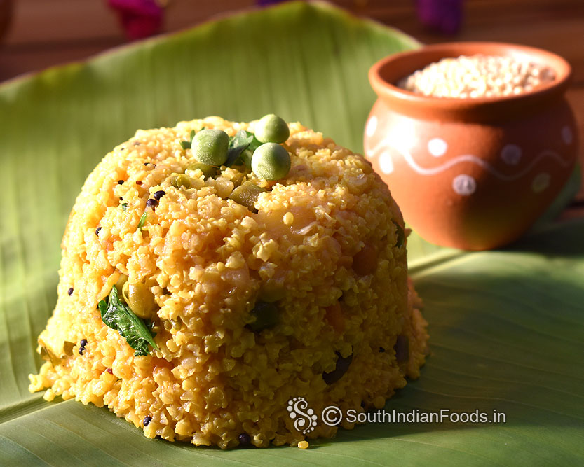 Pressure cook panivaragu toor dal shallots cumin seeds turmeric with water for 4 whistles