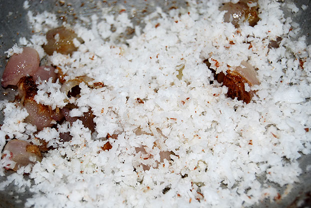 Roast grated coconut
