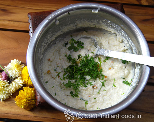 add coriander leaves mix well