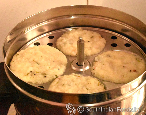 After 10 min, soft and spongy poha idli ready