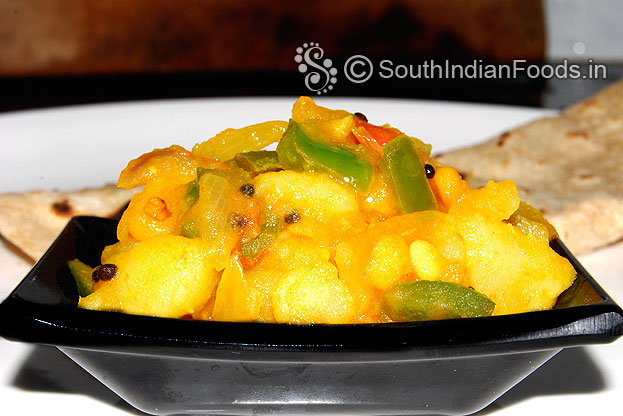 Aloo capsicum poori masala is ready-serve hot with puri or chapti