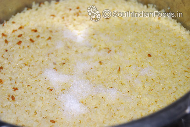 Pressure cook panivaragu toor dal shallots cumin seeds turmeric with water for 4 whistles