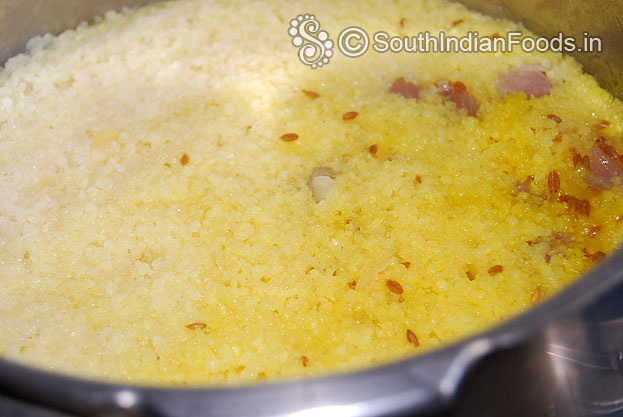 Pressure cook varagu, toor dal, small onion, cumin, turmeric, for 4 whistles with 4 cups of water