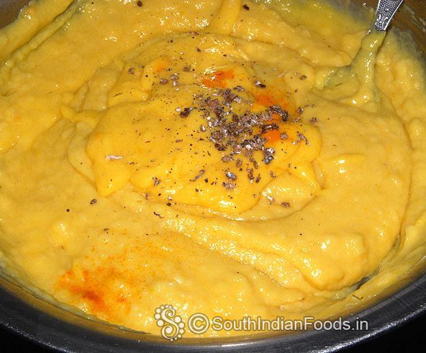 Add turmeric and cardamom powder, mix well