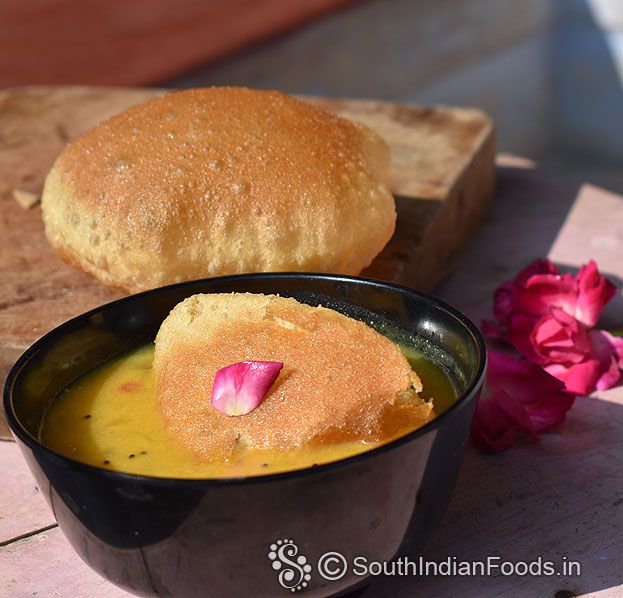 Put puris in kadhi serve hot