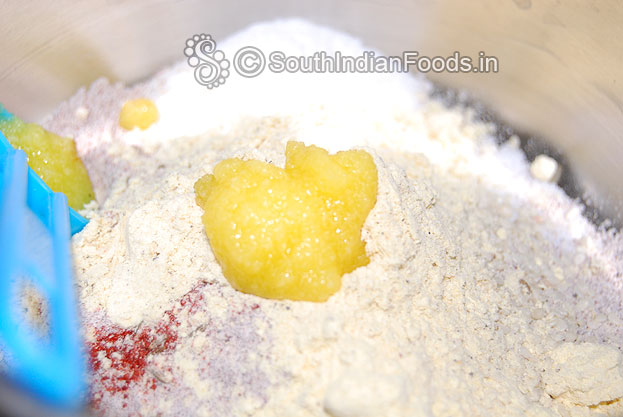 Add ghee and warm water mix well, knead it, & make soft dough
