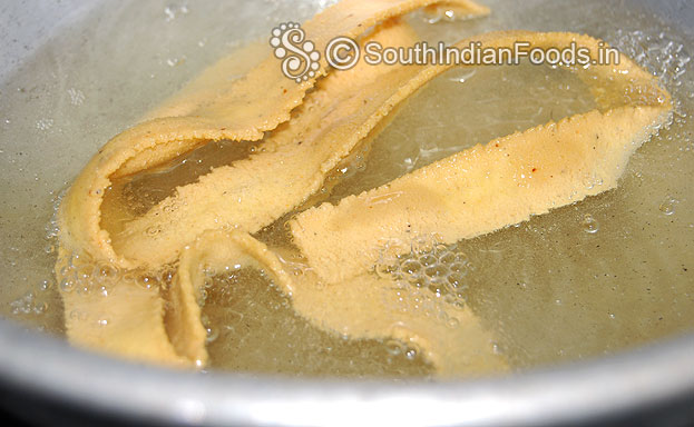 Pakoda is ready take it out drain on absorbent paper