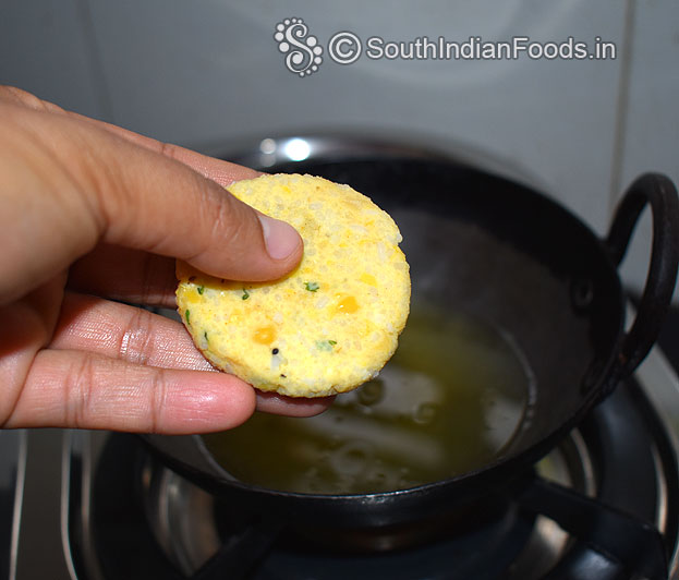 Heat enough oil in a pan, drop it