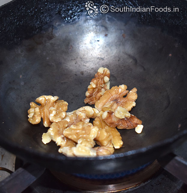 Add walnut, roast till crisp