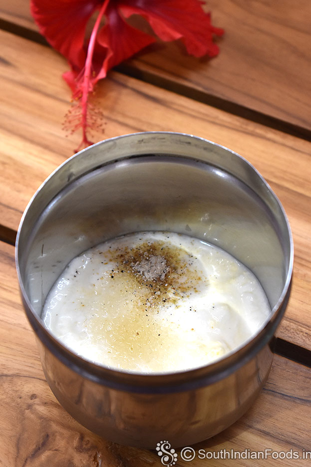 In a bowl add curd, cardamom, sugar
