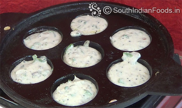 Fill all cavity with paniyaram batter