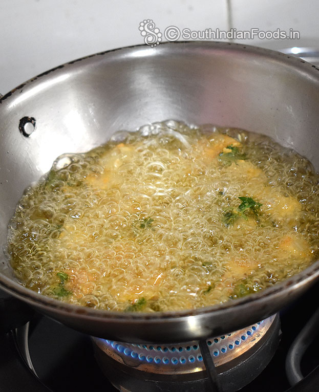 Heat oil, add idli cubes