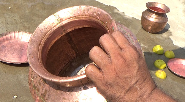 Scrub inside the pot