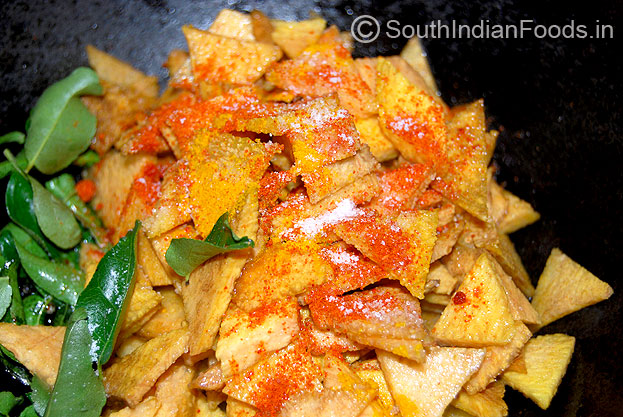 Add turmeric and red chilli powder