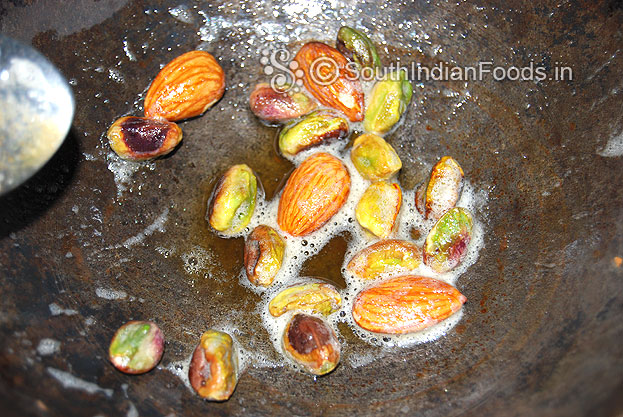 Heat ghee in a pan add almonds & pistachios, roast & chop