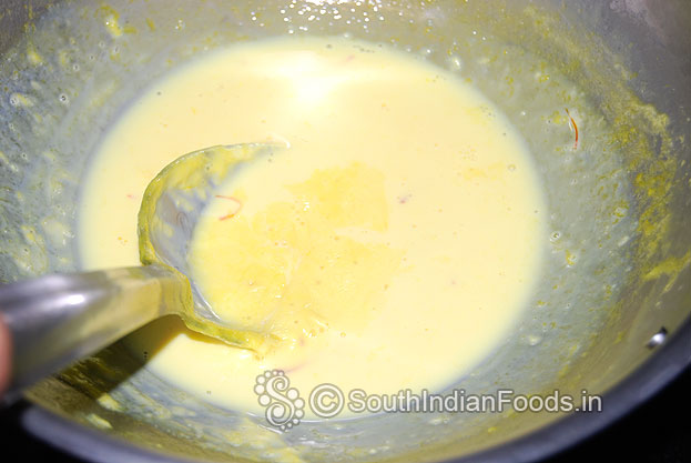 Now milk is slightly thick & reduced to half. This is called rabri. Now cut off heat & let it cool
