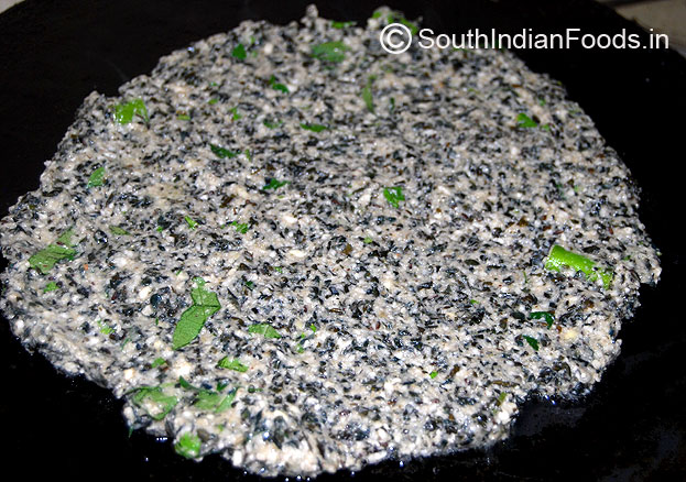 Shape adai in dosa tawa & pour 2 tbsp of oil