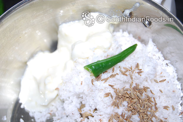 Add grated coconut, curd, cumin seeds & green chilli grind well with 1 cup of water