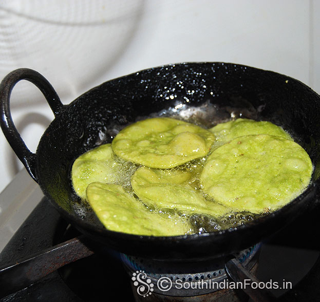 Heat oil in a pan, drop it, deep fry till crisp