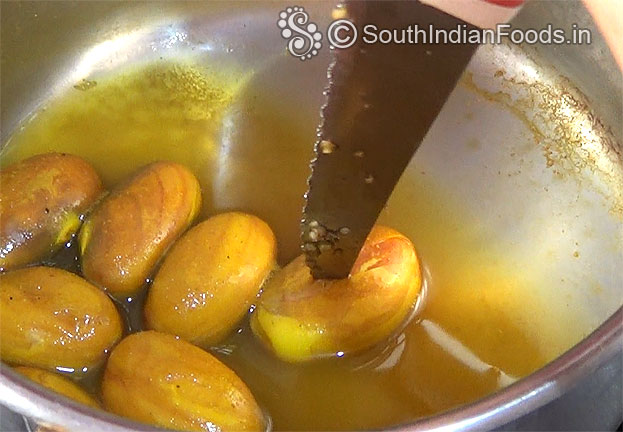 Boil jackfruit seeds with turmeric & red chilli powder