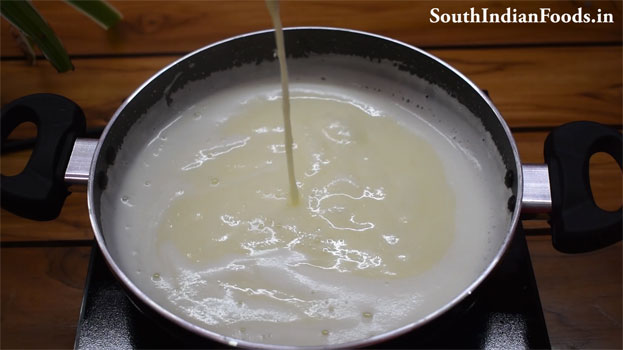 Heat sweet condensed milk in a pan, add grated paneer