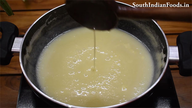 Heat sweet condensed milk in a pan, add grated paneer