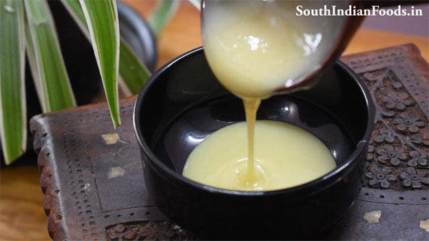 Heat sweet condensed milk in a pan, add grated paneer