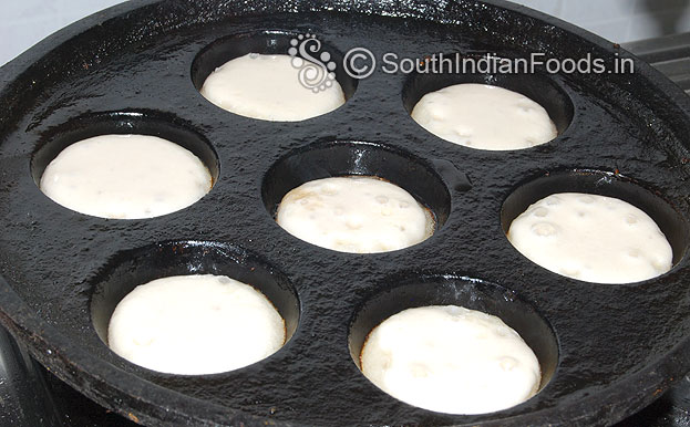 Fill all the cavity, cover lid and cook both sides till golden brown and crisp