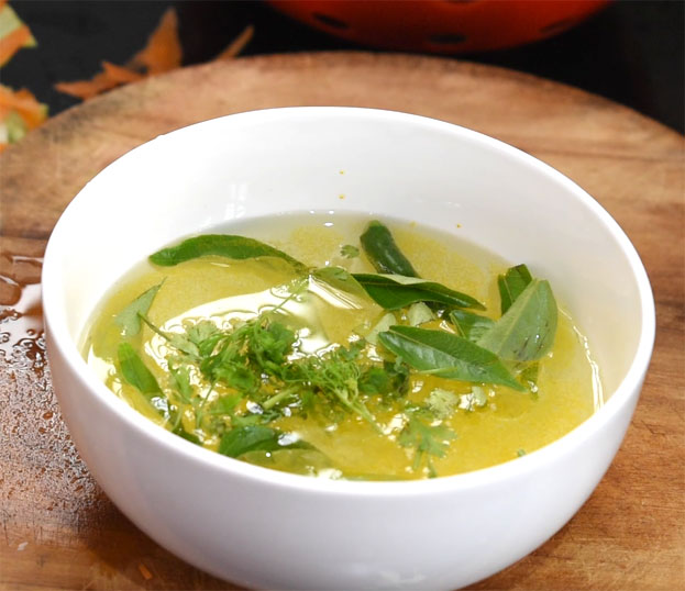 In a bowl add water, turmeric, salt, coriander, green chilli, curry leaves