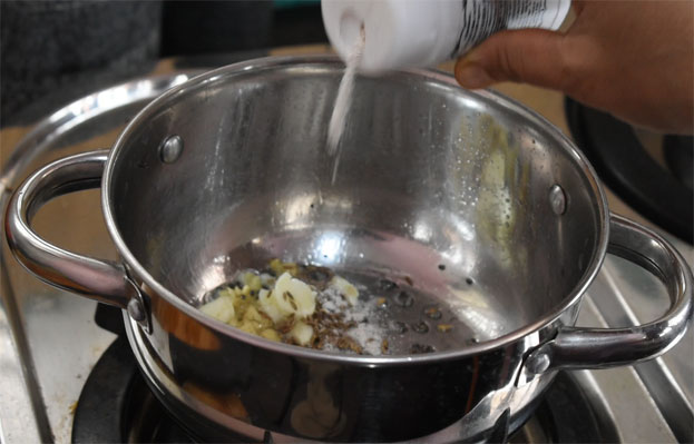Heat 1 tbsp oil, add mustard, cumin, ginger, garlic, asafoetida