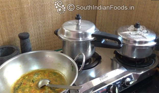 Cover lid, cook for 4 whistles