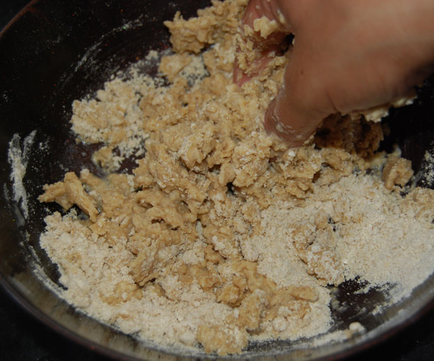 Add water / milk mix well, and make semi soft dough