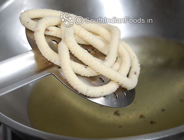 Heat oil in a pan put thenkuzhal murukku & deep fry till crisp.