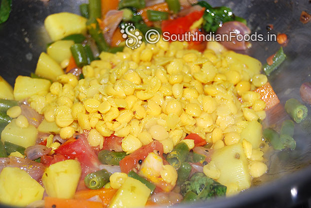 Add boiled bengal gram & toor dal
