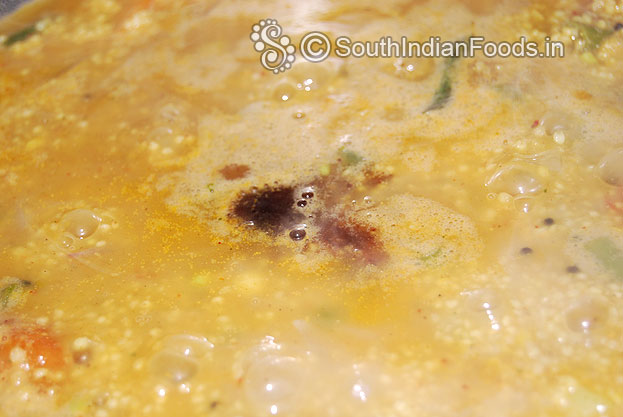 Add tamarind extract or tamarind paste mix well