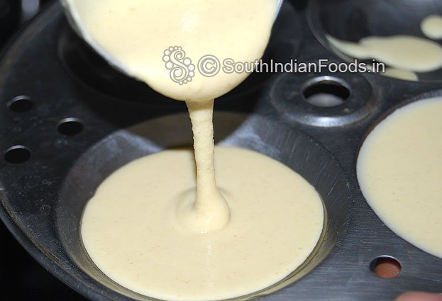 Pour thinai batter in each cavity