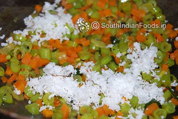 Finally add grated coconut mix well