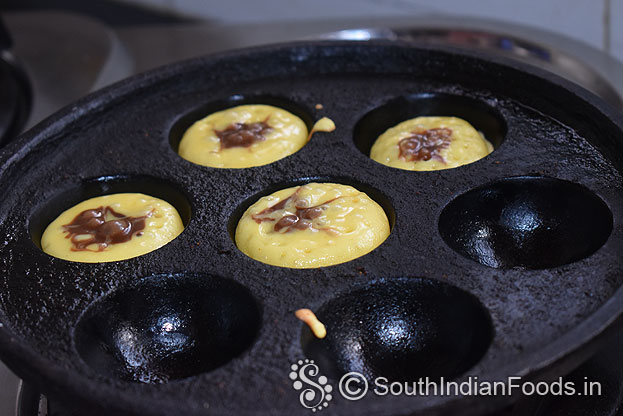 Heat appam/paniyaram tawa, add 1 tbsp oil/butter, pour batter