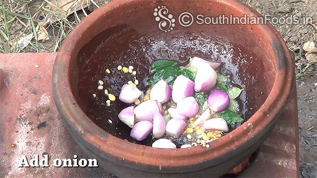 Add small onion, curry leaves