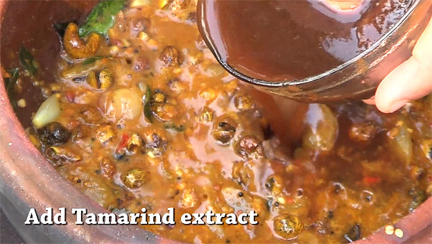 Add tamarind extract, let it boil till raw smell out