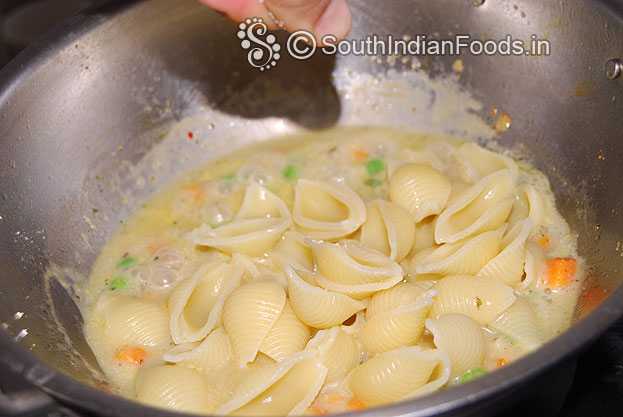 Add cooked pasta and salt mix well