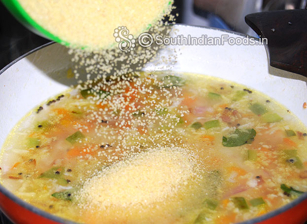 Simmer the gas add bansi rava slowly.