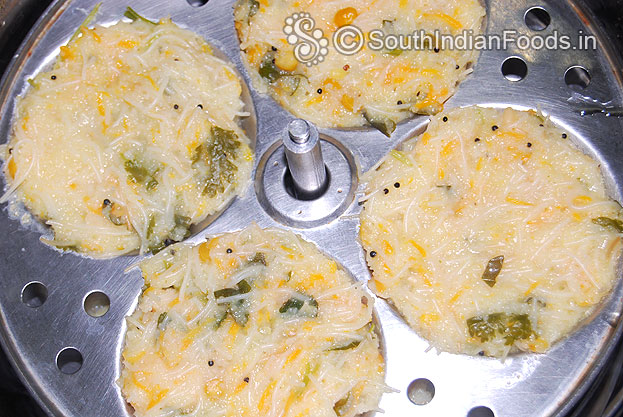 After steaming, de-mould idlis