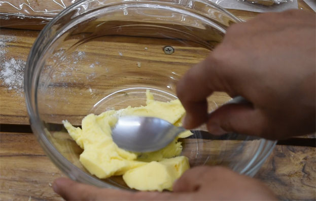 In a bowl add softened butter