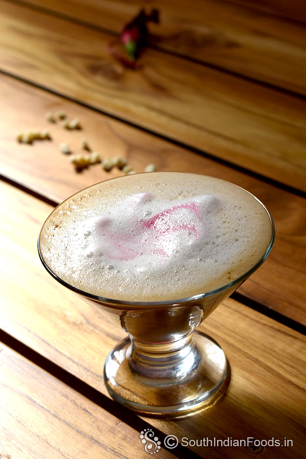 Frothy coffee with white chocolate chips