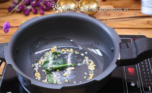Heat pressure cooker, add 2 tbsp oil